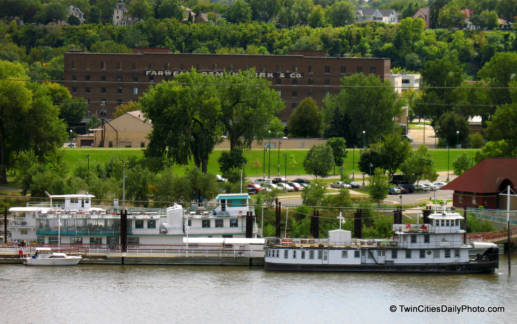 The large boat on the left is the River Boat Grill restaurant, while the boat on the right is the Covington Inn, a bed and breakfast.