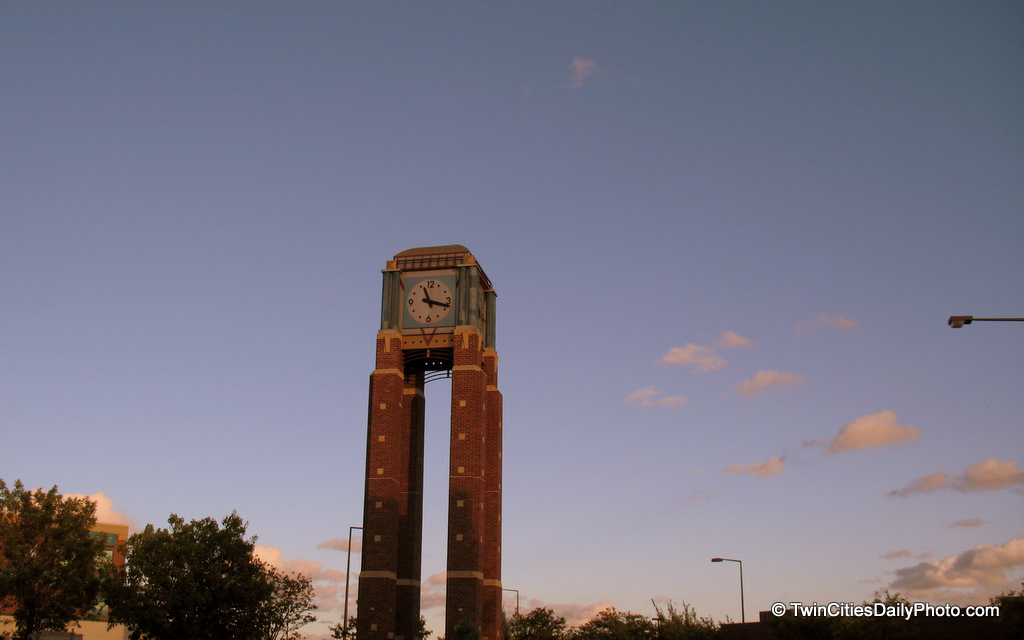 On the corner of 98th Street and Lyndale Avenue in Bloomington. I've been to this location a few times in the past, but always during the daytime. I believe this was the first time I've seen the clock tower as the sun was setting. 
