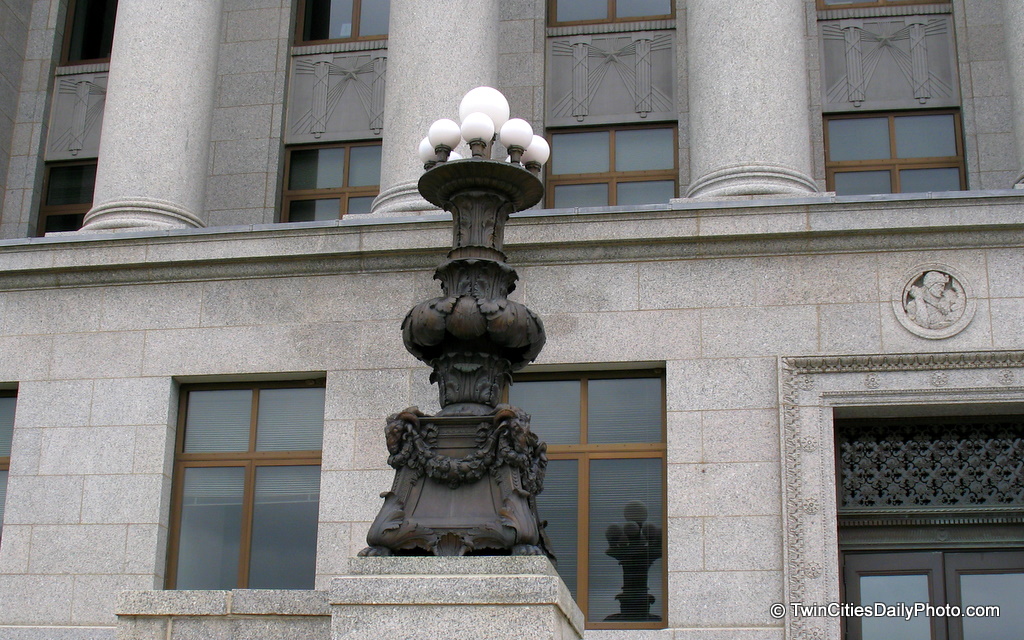 Across from the Minnesota State Capital building are several State buildings. As I was walking past the front doors, I noticed these elaborate lamps.