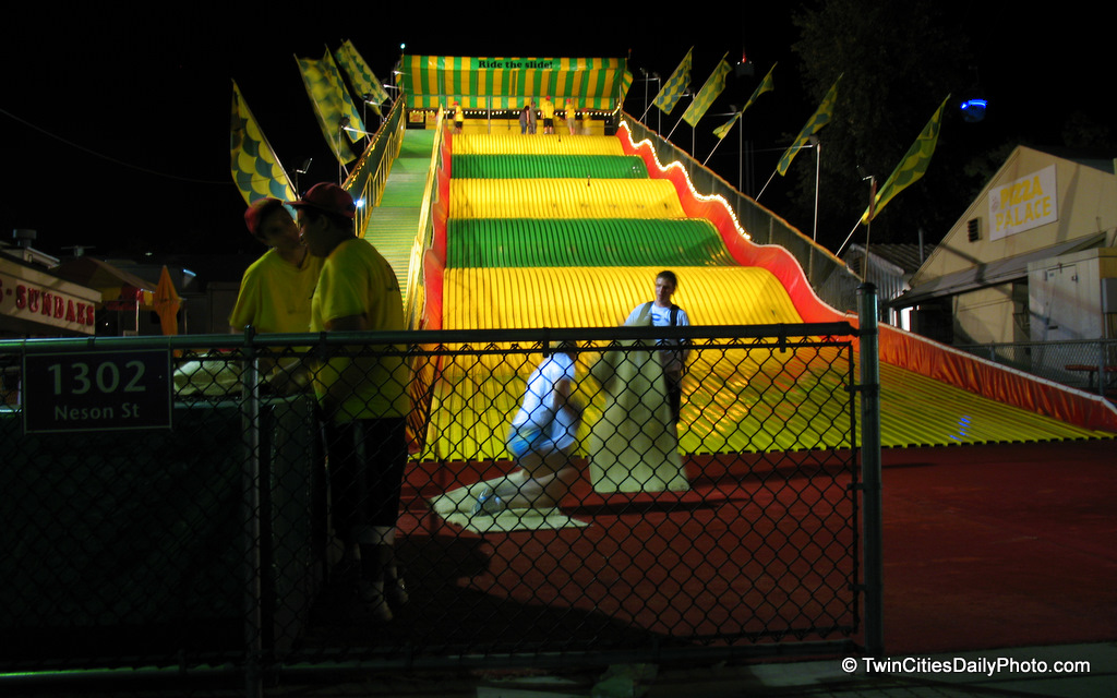 At $2 dollars per ride, it's one of the cheapest activities at the Minnesota State Fair. Granted, it takes you longer to walk up the stairs than it does to come down the yellow and green slide.
