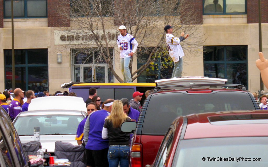 These two guys on top of the van, were up on the roof of the vehicle for nearly two hours while I was tailgating for the Vikings versus Cowboys football game. Whomever you two are, thank you for the photo opportunity. Go Vikes!